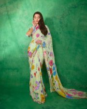 Graceful Nora Fatehi in a Floral Saree Pictures 04