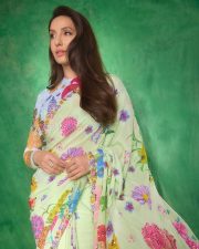 Graceful Nora Fatehi in a Floral Saree Pictures 05