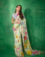 Graceful Nora Fatehi in a Floral Saree Pictures 07
