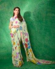 Graceful Nora Fatehi in a Floral Saree Pictures 08