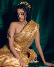 Hot Priyamani in a Gold Saree without a Blouse Photos 03