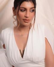 Ivan Than Uthaman Actress Yashika Aannand in a White Outfit Pictures 01