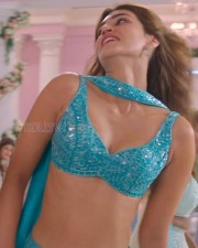 Kriti Sanon Showing Cleavage in a Song and Dance Routine Photos 01