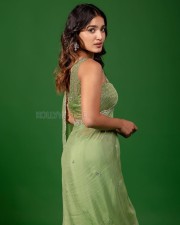 L2 Empuraan Actress Saniya Iyappan in a Stylish Green Saree with Matching Sleeveless Blouse Pictures 03