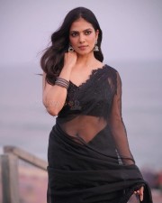 Mallu Beauty Malavika Mohanan in a Sheer Black Saree Photos 03