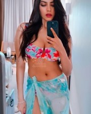 Mallu Hottie Malavika Mohanan in a Floral Bikini Pictures 01
