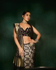 Most Popular Face of the Year Raashii Khanna in a Black Silk Saree with an Off Shoulder Cleavage Blouse Photos 02