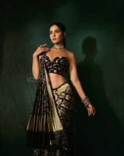 Most Popular Face of the Year Raashii Khanna in a Black Silk Saree with an Off Shoulder Cleavage Blouse Photos 03