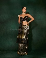 Most Popular Face of the Year Raashii Khanna in a Black Silk Saree with an Off Shoulder Cleavage Blouse Photos 06