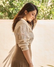 Parasakthi Heroine Regina Cassandra in a Linen Textured Shirt and Sueded Fringe Skirt Photos 03