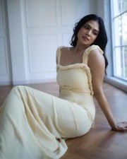 Passionate Malavika Mohanan in a Yellow Bodycon Dress Photos 05