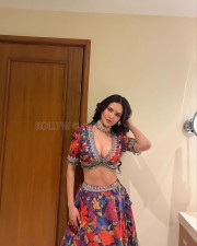 Sexy Esha Gupta Deep Cleavage in a Colourful and Bold Lehenga Choli Photos 02