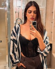 Sexy Malavika Mohanan Mirror Selfie in a Black Corset and Striped Shirt Photos 01