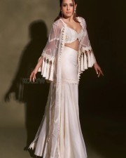 Sexy Nushrratt Bharuccha in a Vanilla Fringe Cape Sharara Photos 01