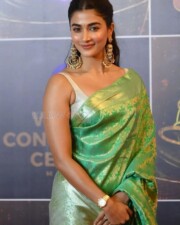 Sexy Pooja Hegde in a Sleeveless Green Silk Saree Photos 02