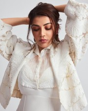 Sexy South Actress Kajal Aggarwal in a White Bodycon Dress Photoshoot Pictures 03