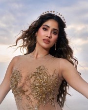 Sizzling Hot Janhvi Kapoor in a Thigh High Slit Golden Skirt with a Tiara Pictures 01