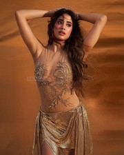 Sizzling Hot Janhvi Kapoor in a Thigh High Slit Golden Skirt with a Tiara Pictures 08