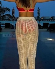 Sizzling Hot Nushrratt Bharuccha in a Transparent Pant with Red Bikini Photos 04