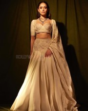 Sizzling Nushrratt Bharuccha in a Beige Lehenga with a Plunging Neckline Blouse Photos 04