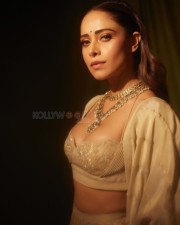 Sizzling Nushrratt Bharuccha in a Beige Lehenga with a Plunging Neckline Blouse Photos 08