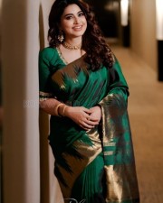 Smile Queen Sneha in a Green Silk Saree Photos 06