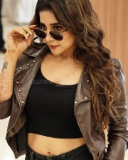 South Actress Sakshi Agarwal in a Black Crop Top and Black Jeans with a Matching Brown Leather Jacket Photos 05