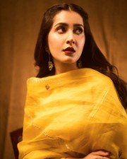 Sparkling Beauty Raashi Khanna in a Vibrant Yellow Kurta Set Photos 02