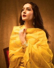 Sparkling Beauty Raashi Khanna in a Vibrant Yellow Kurta Set Photos 03