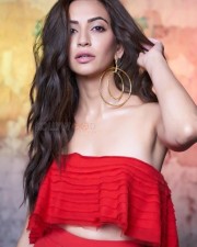 Stunning Actress Kriti Kharbanda in Sleeveless Bright Red Tube Crop Top and Palazzo Pant Photos 02