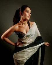 Stunning Beauty Raashi Khanna in a Black and White Saree with an One Shoulder Blouse Photos 05