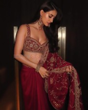 Stunning Disha Patani in a Red Saree with a Bralette Blouse Pictures 03