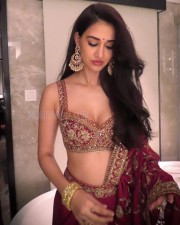 Stunning Disha Patani in a Red Saree with a Bralette Blouse Pictures 04