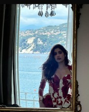 Stunning Janhvi Kapoor in a Red and White Mini Dress with a Bustier Neckline Photos 05