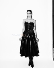 Stunning Malavika Mohanan in a Bold Black Off Shoulder Gown Photos 01