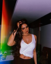 Stunning Malavika Mohanan in a See Through White Top with Lace Bra Photos06