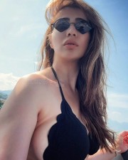 Stunning Raai Laxmi Cleavage in a Tiny Black Bikini Photos 01