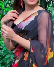 Stunning Rashmika Mandanna in a Floral Printed Transparent Saree Pictures 05