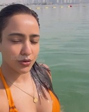 Stunning and Hot Neha Sharma in an Orange Bikini Photos 03