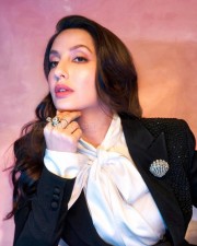 Stylish Nora Fatehi in a Black Power Suit Photos 01