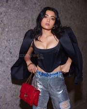 Stylish Rashmika Mandanna in a Black Corset and Blazer with a Rugged Jeans at Versace Milan Show Photos 06