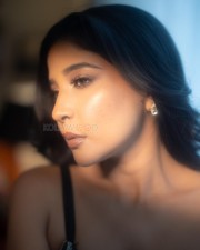 Stylish Sakshi Agarwal in a Black Narrow Slit Dress Photos 02