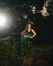 Tollywood Actress Raashii Khanna in a Green Velvet Organza Silk Embroidered Floral V Neck Sharara Set Photos 09