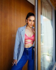 Tollywood Actress Rakul Preet Singh in a Pink Bra Blue Pant and Suit Photos 02