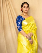 Anasuya Bharadwaj in a Bright Yellow Saree with a Royal Blue Blouse Pictures 03
