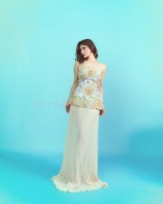 Beautiful Mouni Roy in a Pastel Off Shoulder Floral Top with Maxi Skirt Photos 01