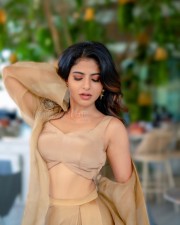 Bhaje Vayu Velya Actress Iswarya Menon in a Golden Crop Top with Matching Skirt Photos 03