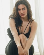 Captivating Amyra Dastur in a Black Bodycon Dress Photos 03