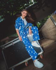 Fashionable Dhvani Bhanushali in a Blue Printed Jacket and Matching Pant with a White Crop Top Photos 01