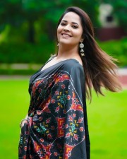 Hot Anasuya Bharadwaj in Black Floral Saree Photos 04